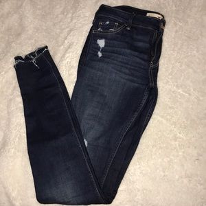 Hollister dark blue , lightly distressed jeans